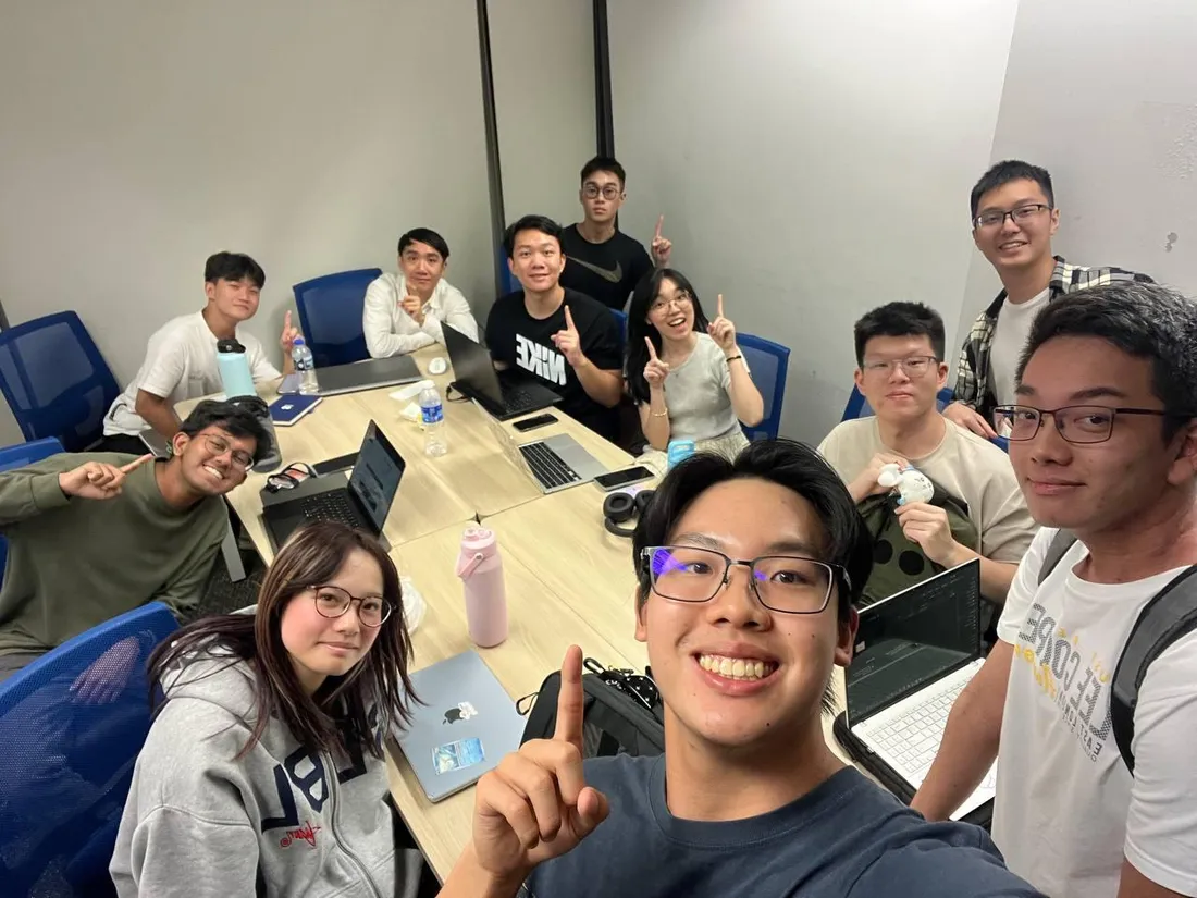A past AI Lodge group together after a session.